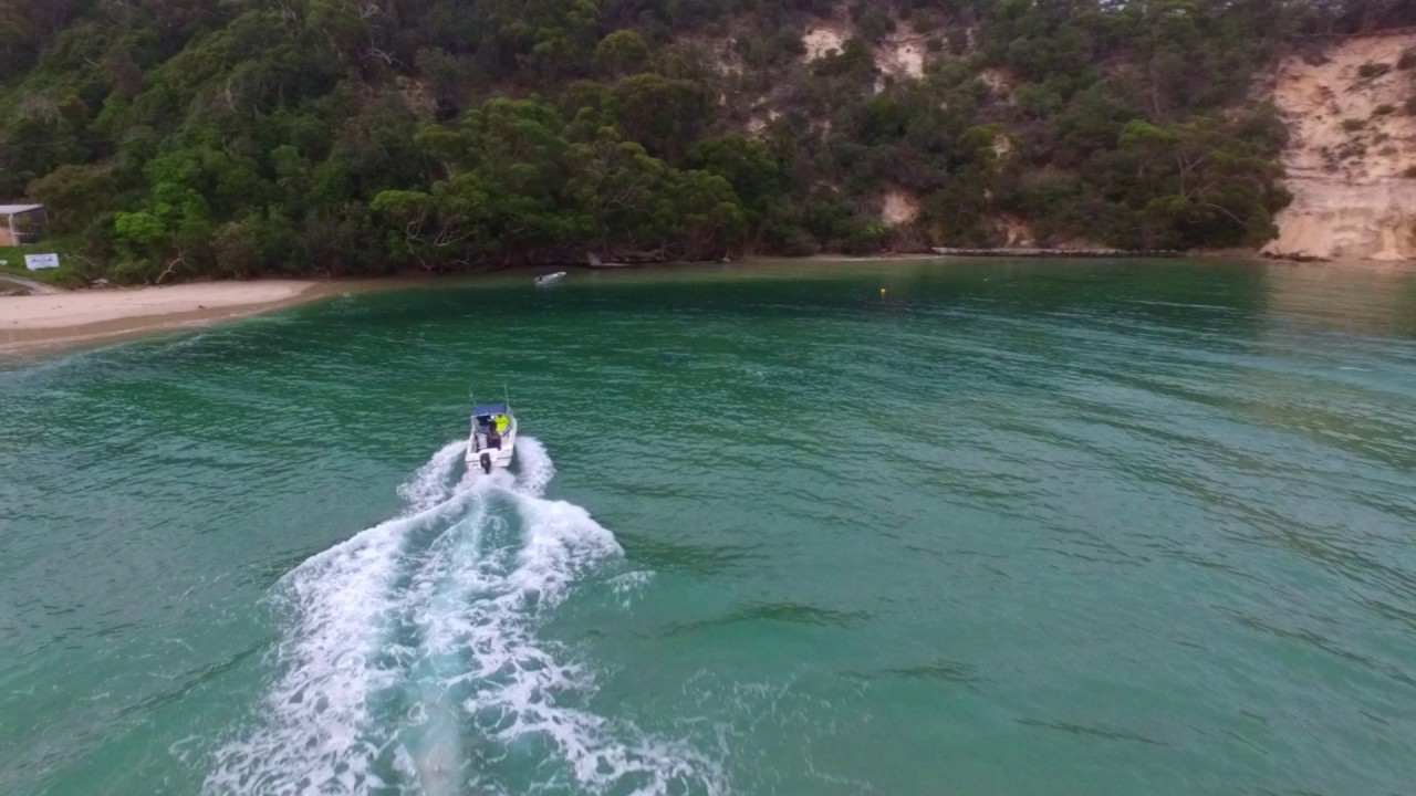drone sussex inlet nsw boat going out over the bar wave jumping