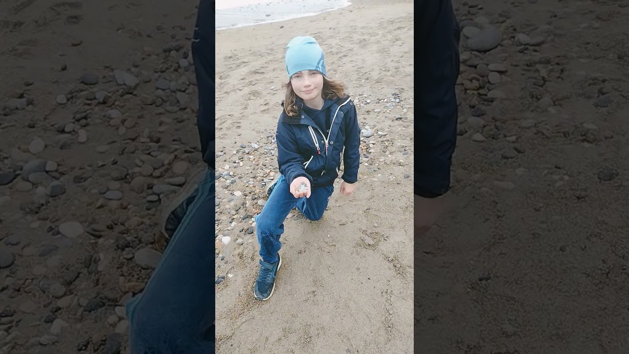 Searching for sea glass at Seaham, England.