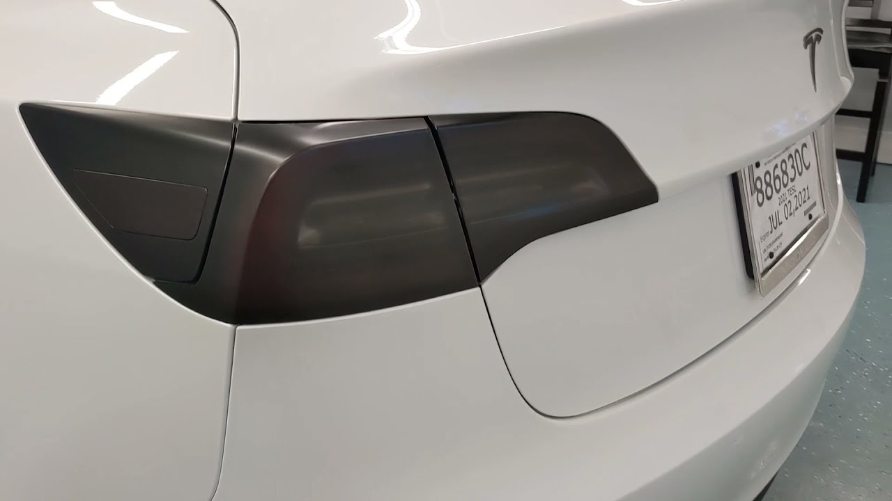 Luxe Lightwrap Mid stealth smoke film applied to Tesla model 3 taillights.
