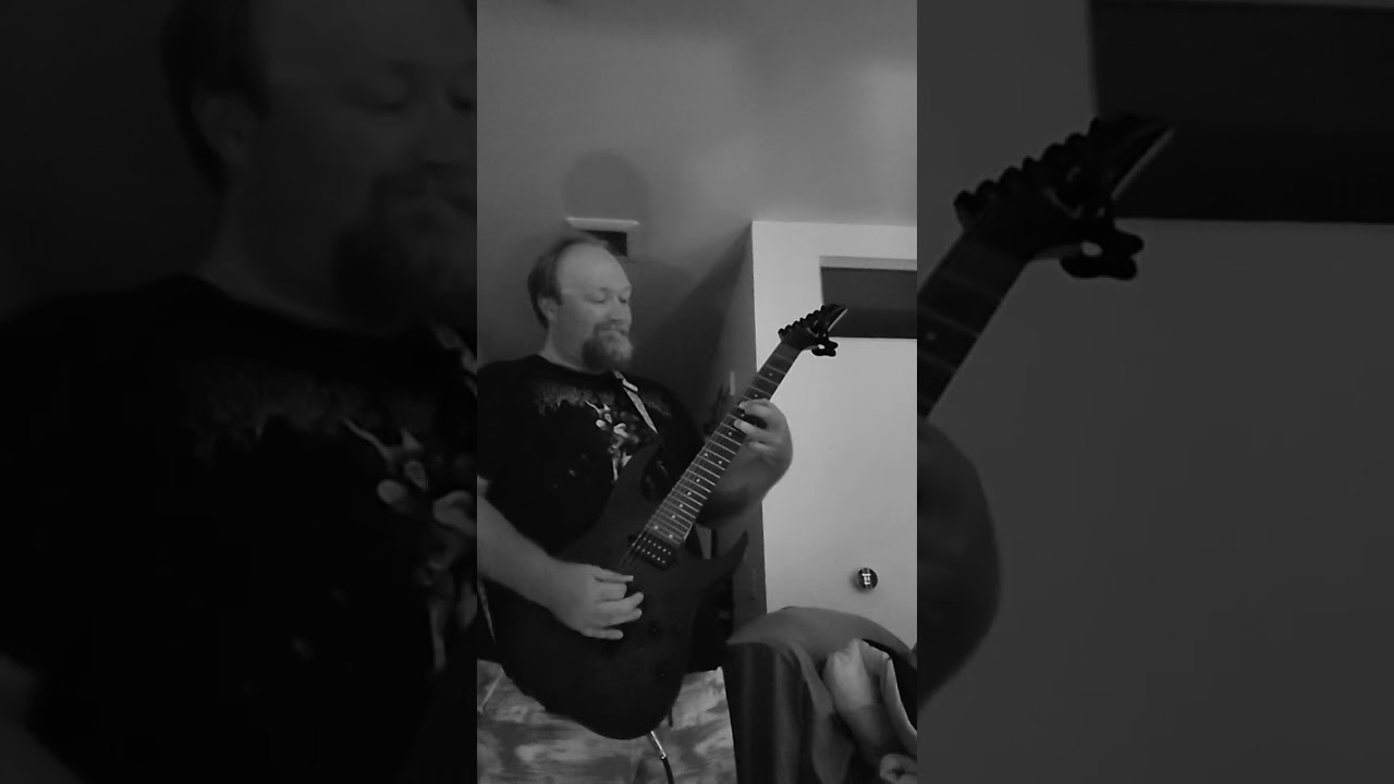 Dark mood, dark music. Black Metal noodlin 7 string guitar.