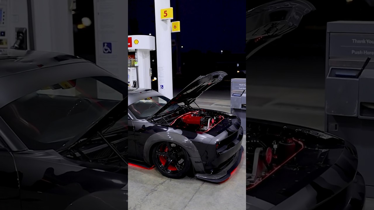 Carbon fiber wide body kit with a triple black camo wrap