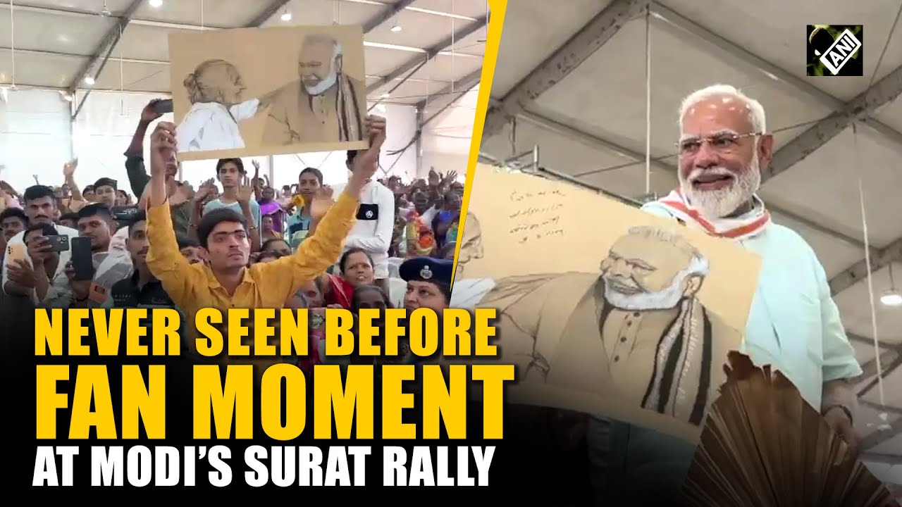Emotional Fan Moment! Artist weeps as PM Modi signs his painting during rally in Surat