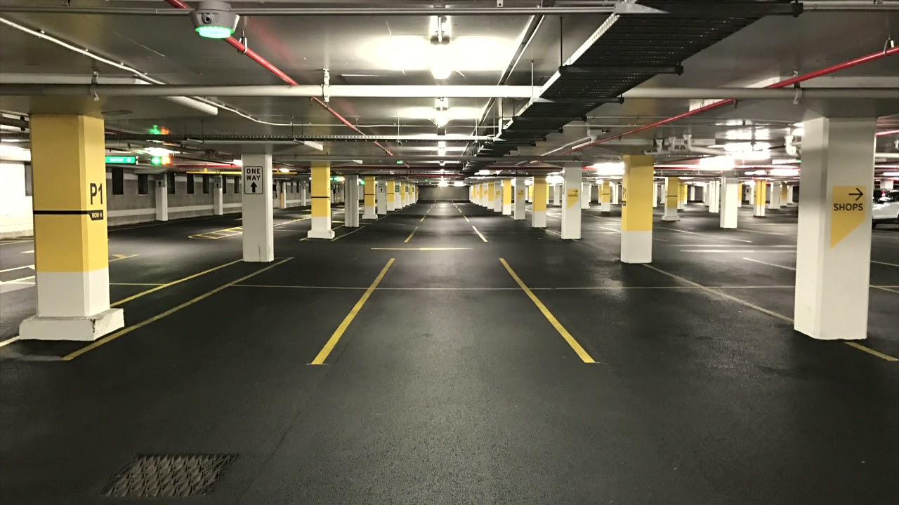 Tokyo Drift by Teriyaki Boyz but is played in an empty shopping center car parking
