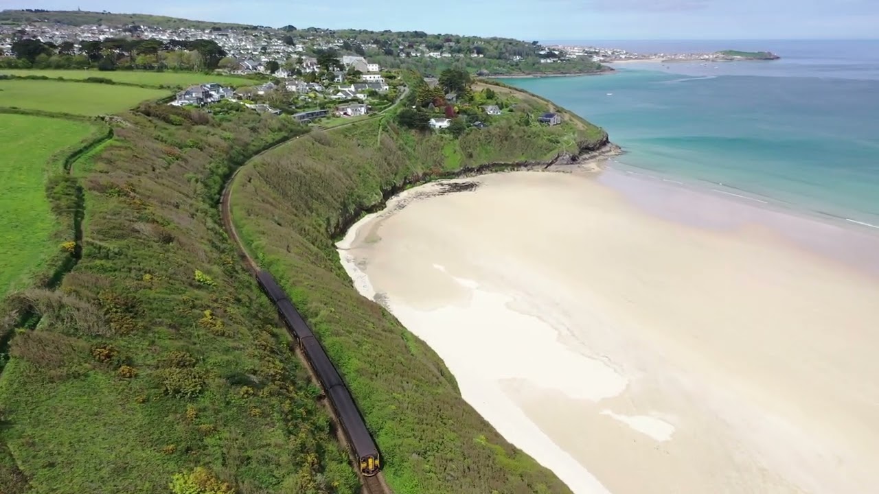 Drone following train from Lelant to Carbis Bay, Cornwall.