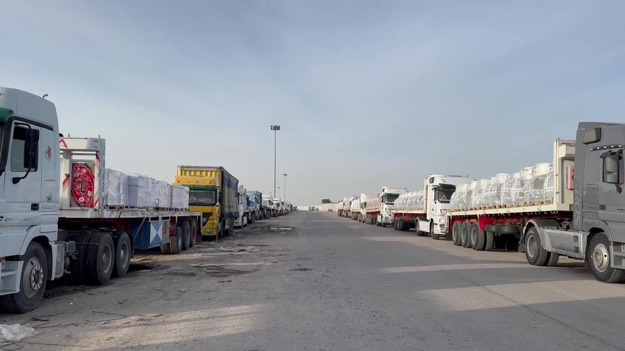 Aid trucks line up in Egypt's Rafah as Israel agrees to 'limited reopening' | AFP