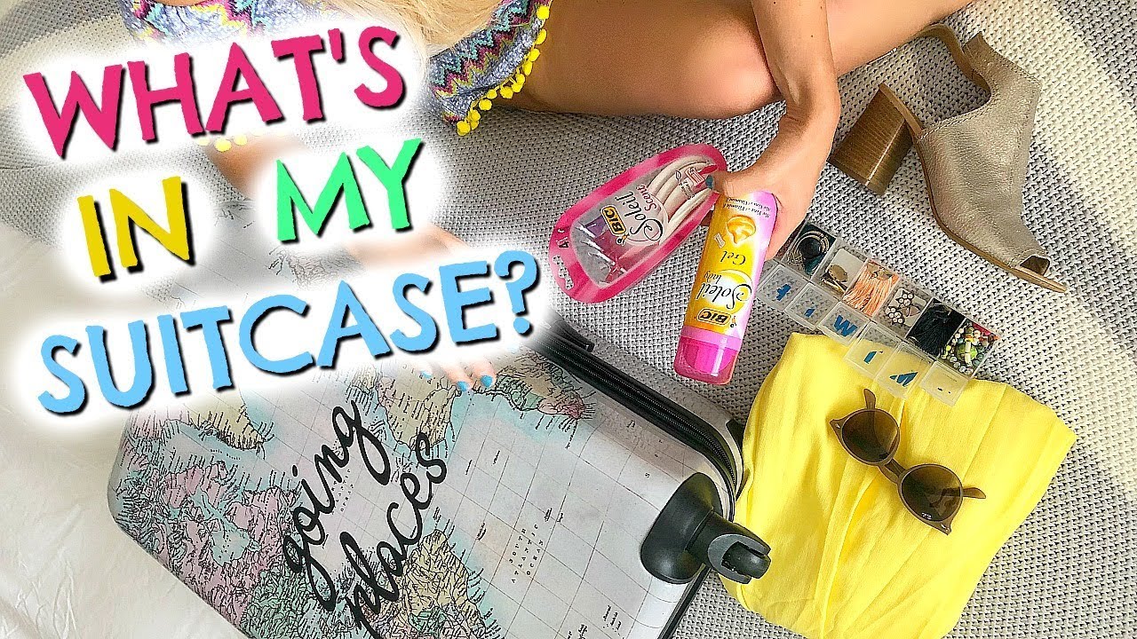WHAT I PACK IN MY SUITCASE  & MY TRAVEL ESSENTIALS  |  PACK WITH ME  |  EMILY NORRIS AD