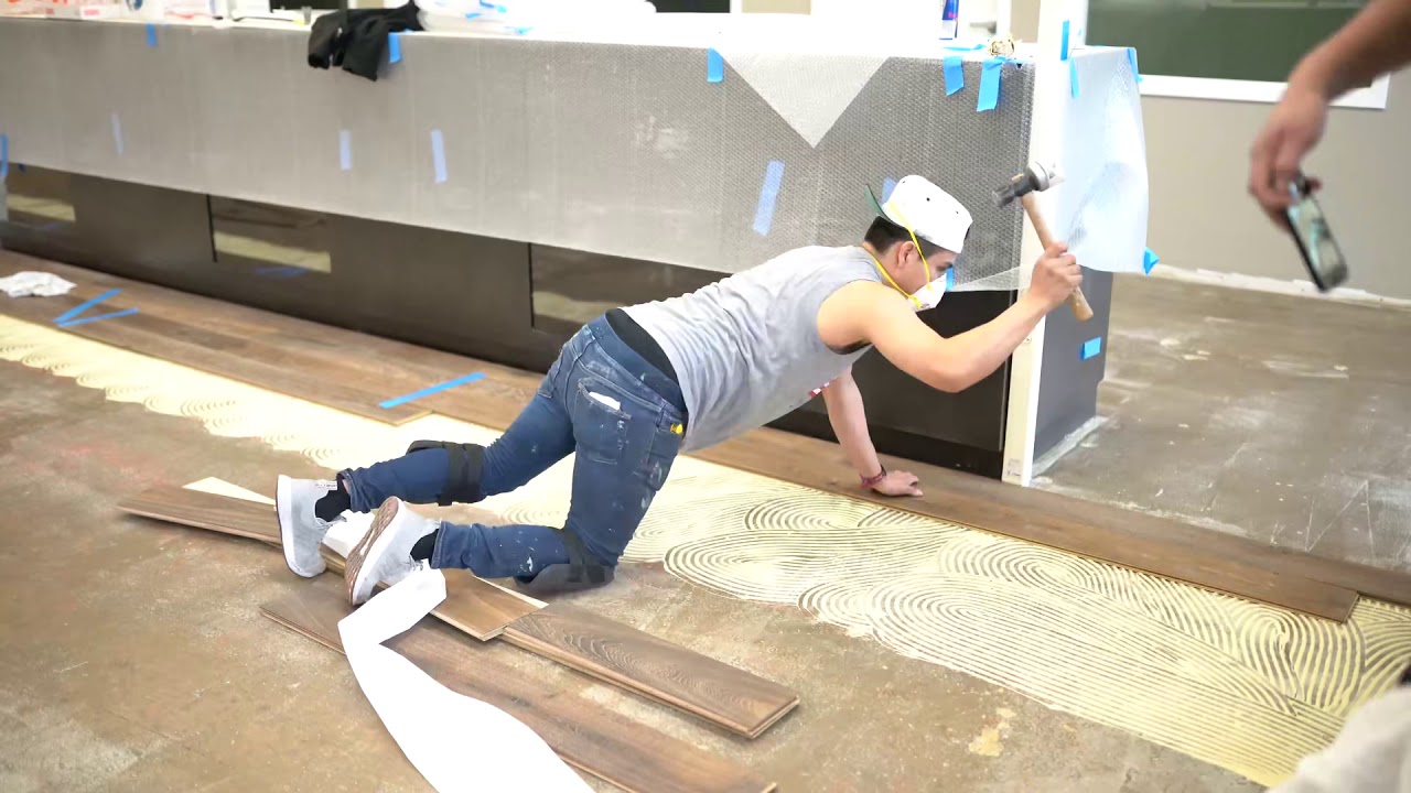 Engineered hardwood glue down process