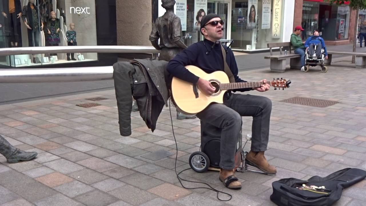 Street musician/singer songwriter in Perth