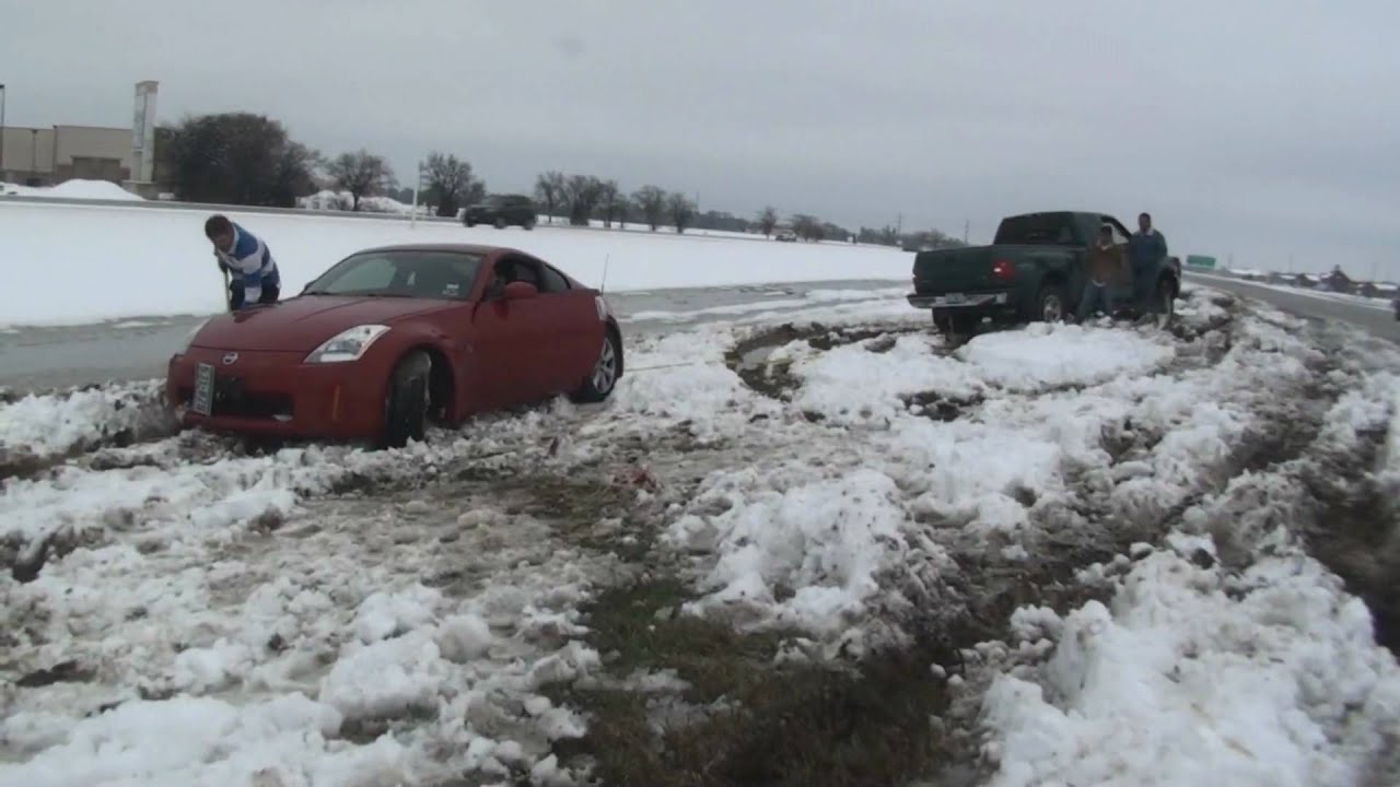 Four truck to get one car out of snow.  read description