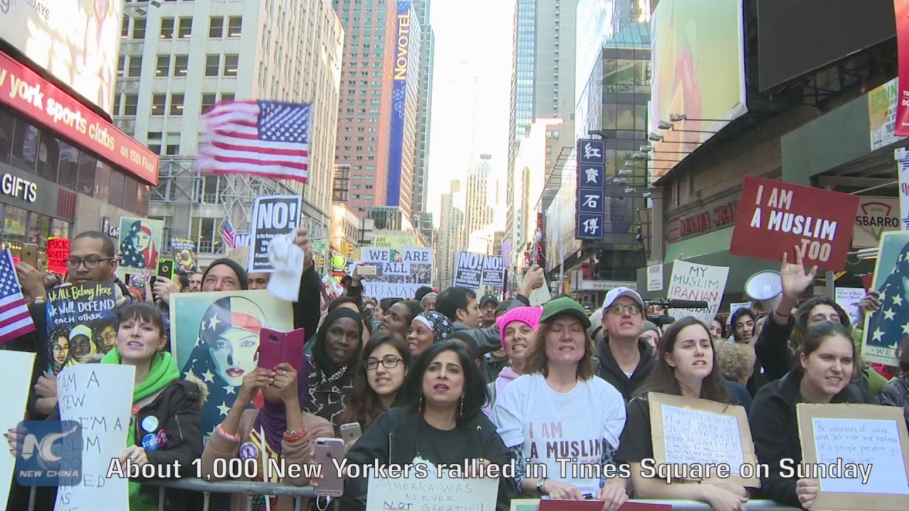New Yorkers rally in Times Square against Trump's immigration policy