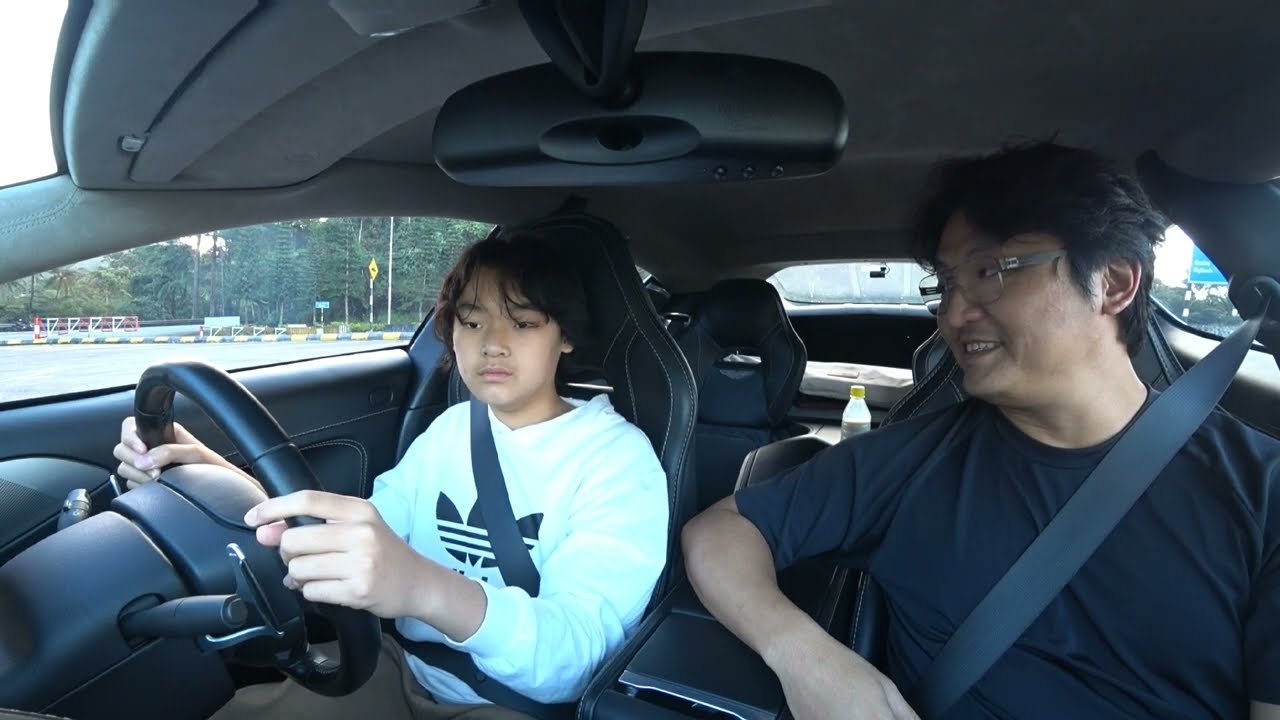 First driving lesson in a V12 🤣 (in empty parking lot)
