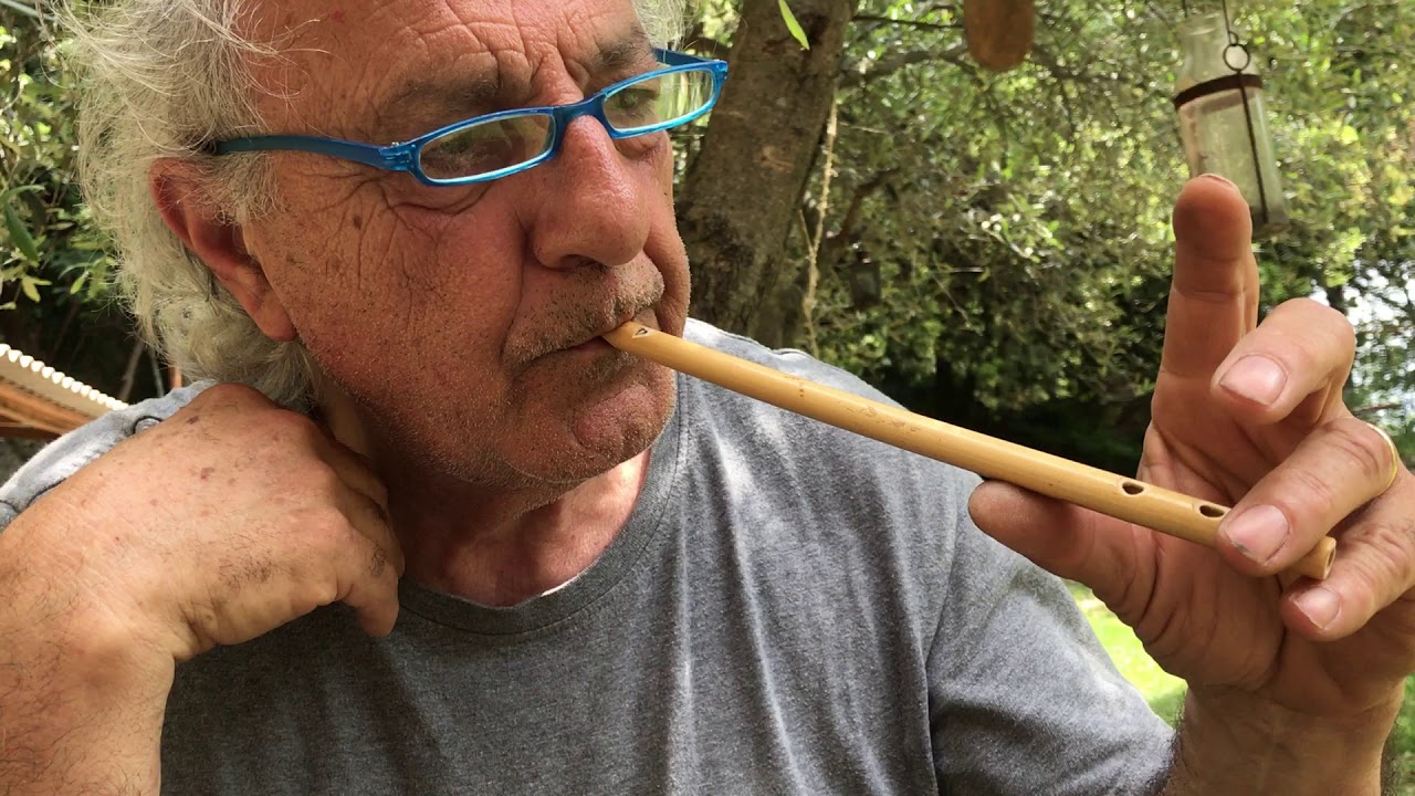 Yves Rousguisto playing a newly made &laquo; galoubet&nbsp;&raquo; (flute Proven&ccedil;ale)