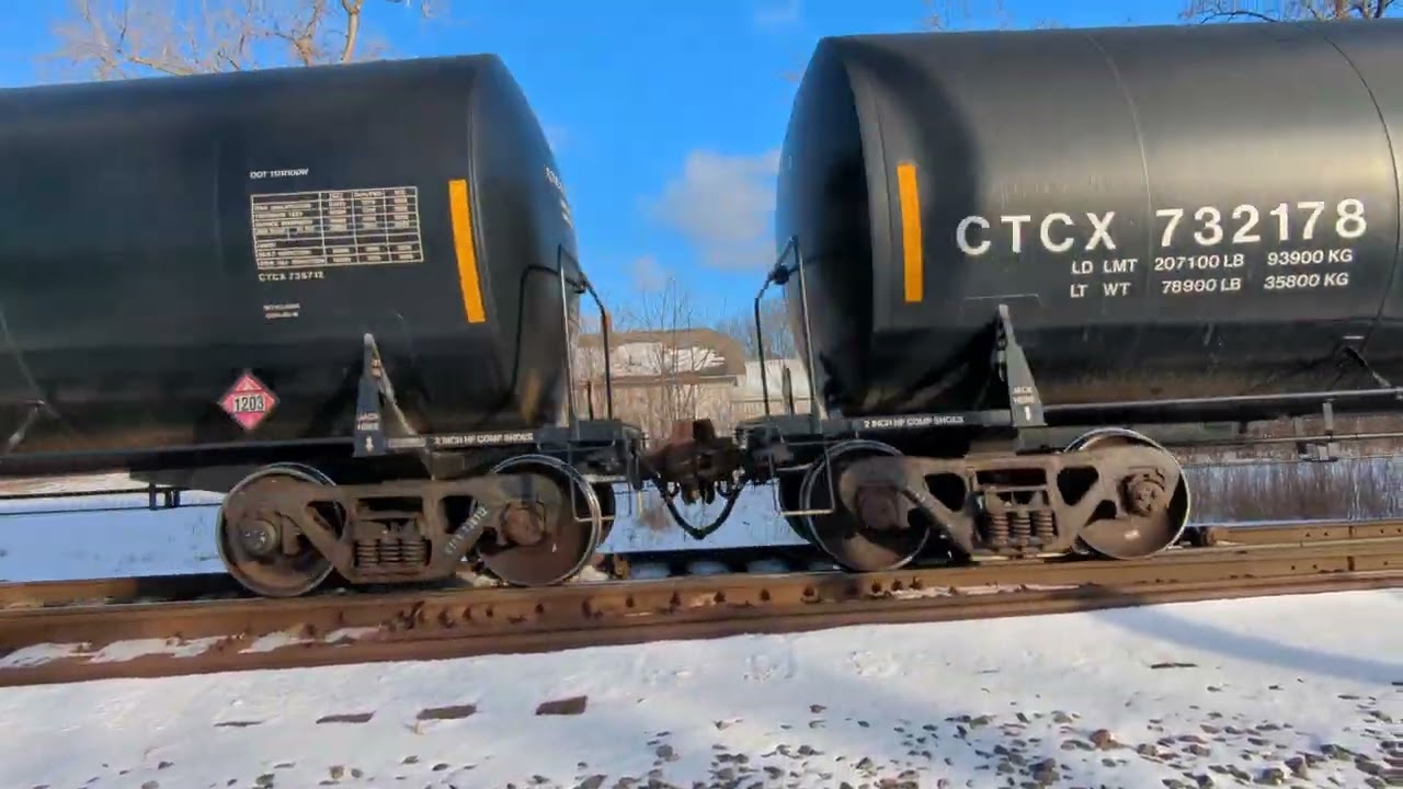 Southbound CN Ethanol with other goods on the Leighton Sub at Spalding with a Rebuilt dash 9 leading