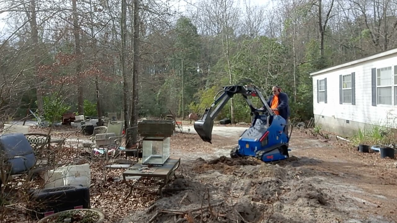 First time using the backhoe or straight arm digger attachment