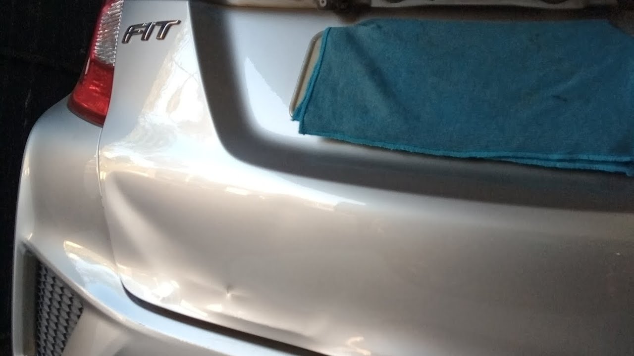 👉 Martelinho de Ouro no porta-malas do Honda Fit 🔨