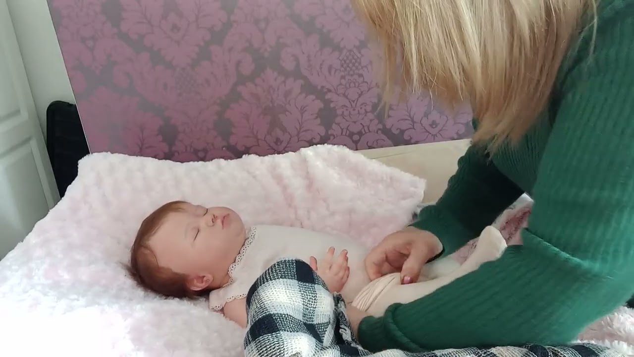 Sophia and Gracie. Mae changing into new next rompers