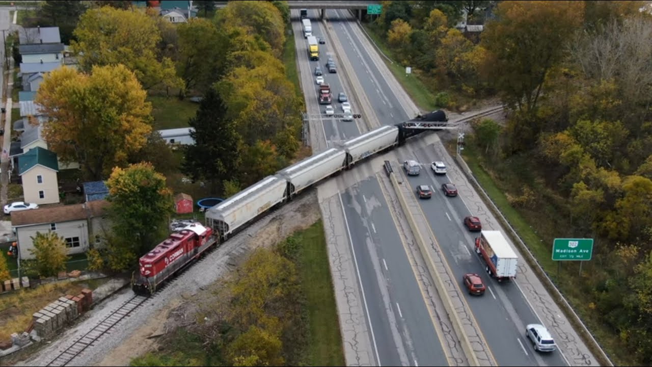 Train shoves across 4 lane freeway RJ Corman Wooster line RJC 4119 GP20
