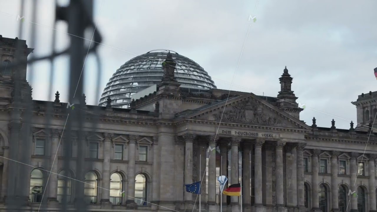 Middle section of Deutscher Bundestag building with steel and glass cupola. German, Israeli and EU