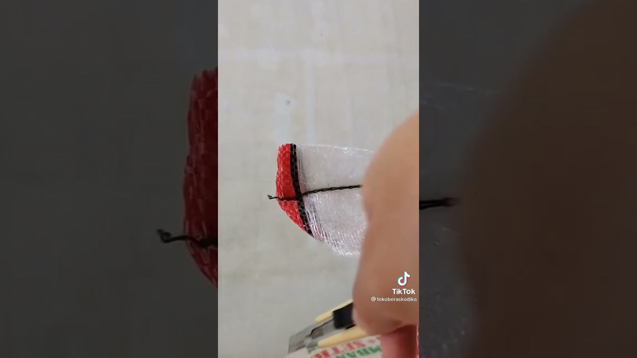 cara buka karung beras yang benar