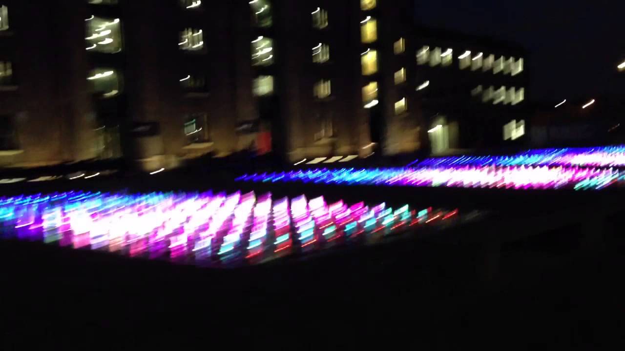 Multicoloured fountains at Granary Square, Kings Cross, London
