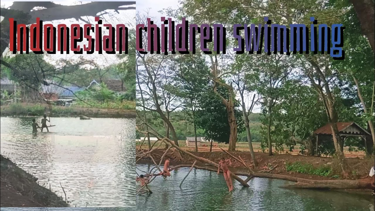indonesian children swimming in the lake