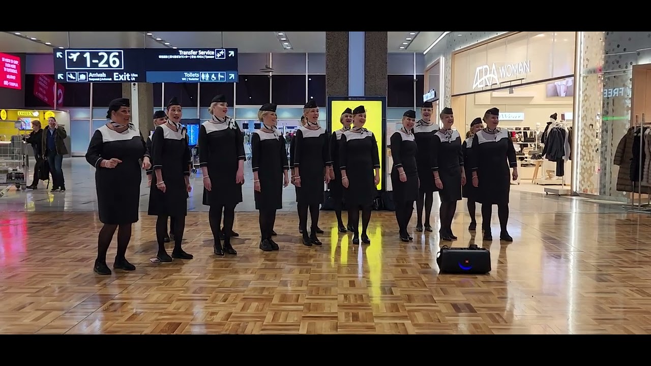 Finnair Choir at Helsinki - Vantaa Airport on Nov 1, 2023, to celebrate airline's 100th Anniversary.