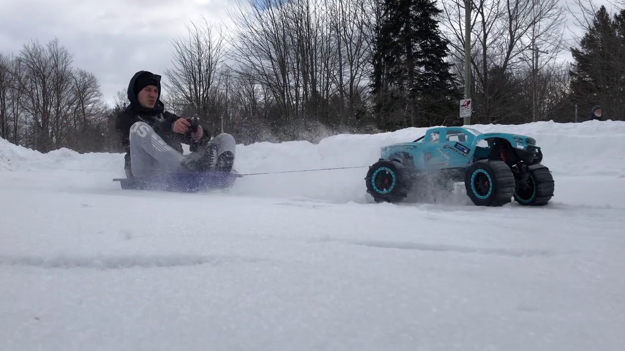 Xmaxx 8s paddle snow pull 145lb on sled funny