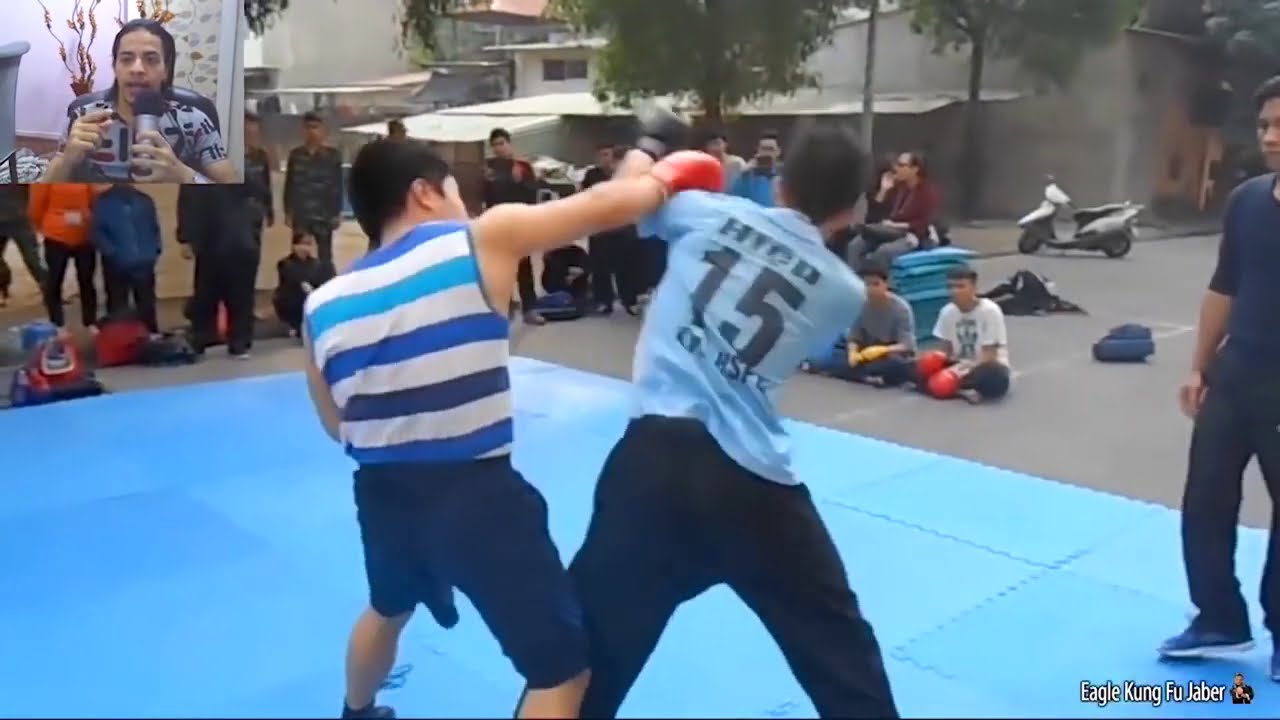 ملاكم يتحدي لاعب كونغ فو أمام الملأ Kung fu Vs Boxing