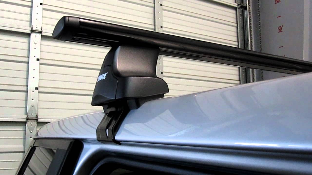 2003 Land Rover Range Rover HSC with Thule 480R Traverse AeroBlade Roof Rack by Rack Attack