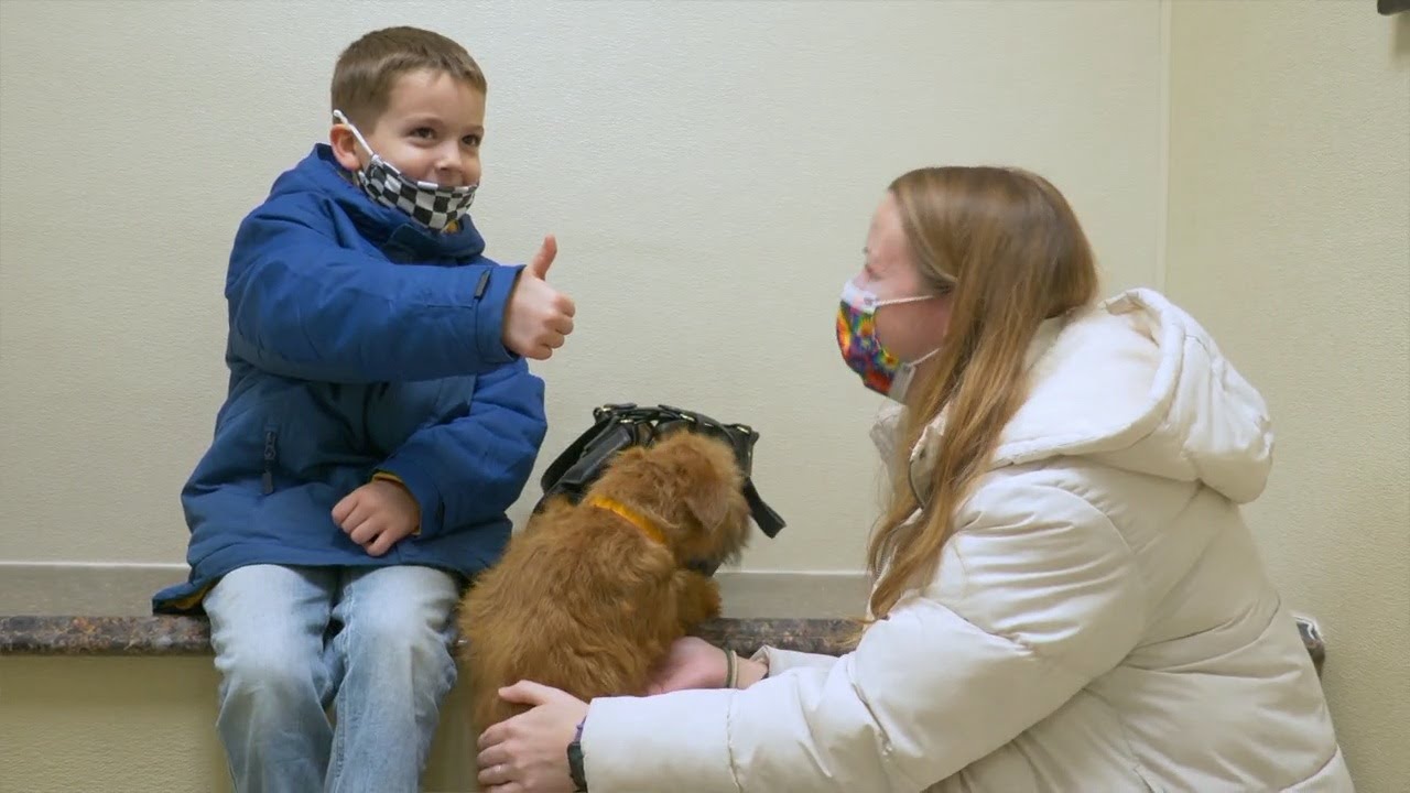 Surprise Squad pays adoption fee for woman's new dog