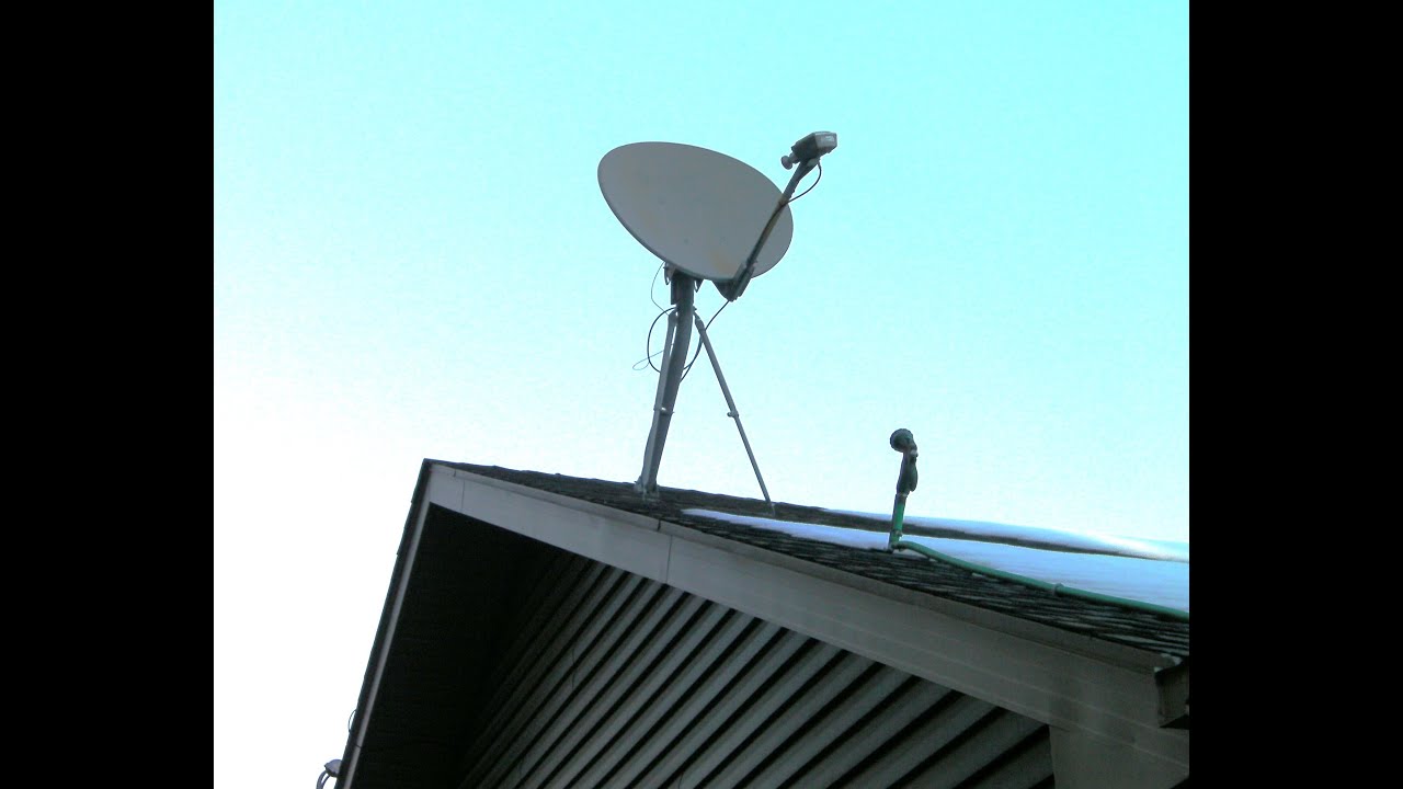 Satellite Dish Ice and Snow Remover Using Hot Water operated from Inside the House.