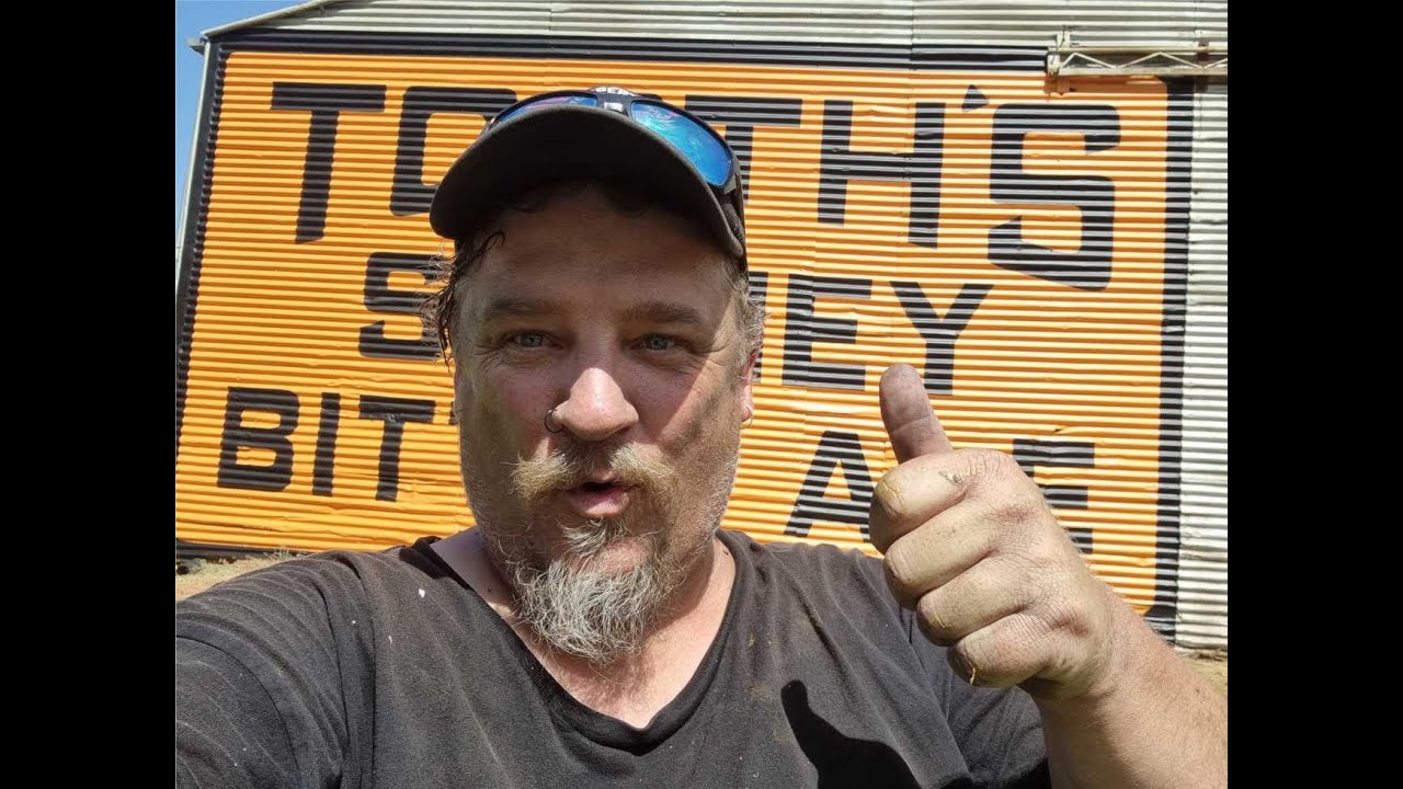 It's Beer O'Clock! Saving iconic beers signs one brush stroke at a time