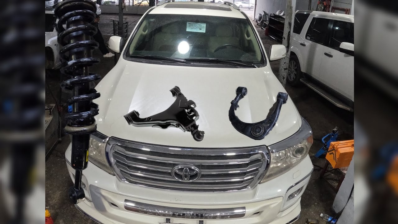 TOYOTA - LAND CRUISER - replacing shock absorber - replacing upper and lower control arm