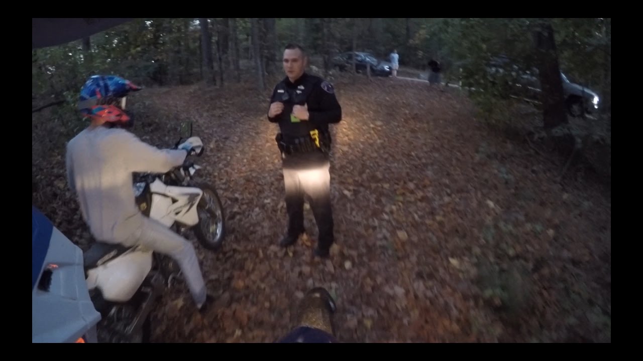 BUSTED WHILE TRESPASSING -- Cop Schools Property Owner