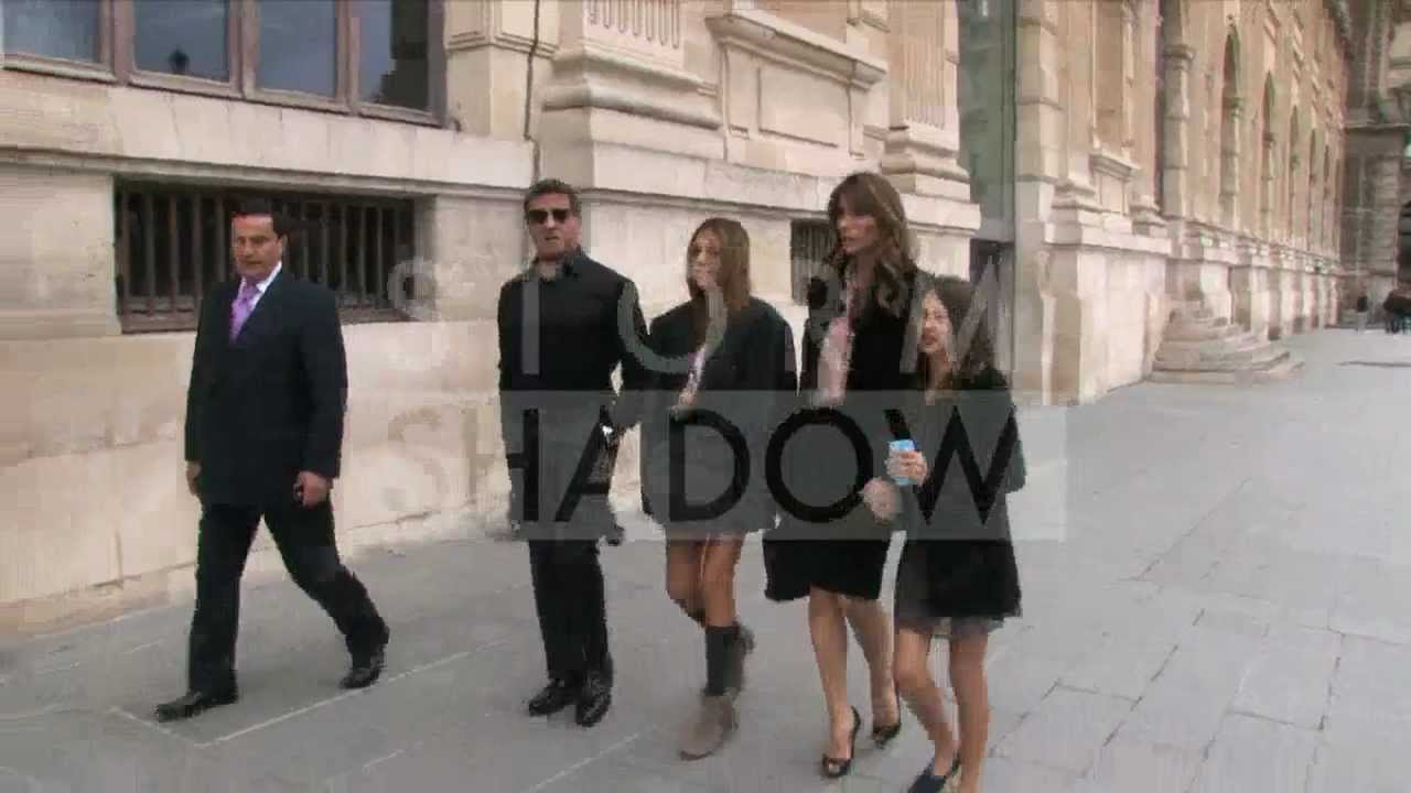 Stallone and family walking in the galleries of the Carrousel du Louvre in Paris