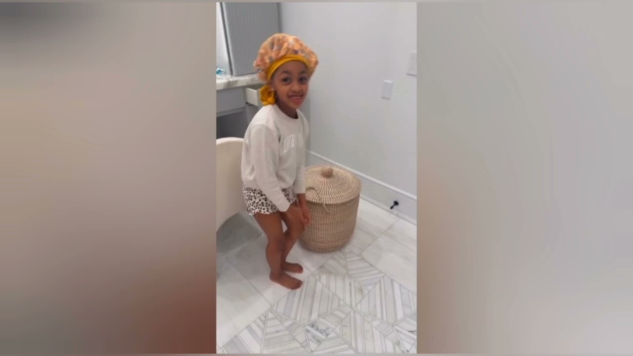Cardi playing with her kids... uber eats delivery