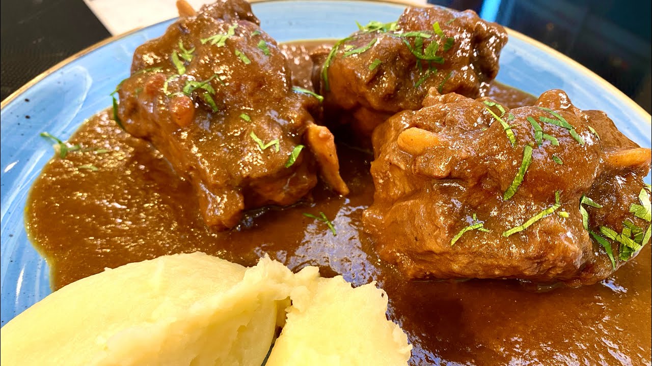 Hearty oxtail stew . Spanish style