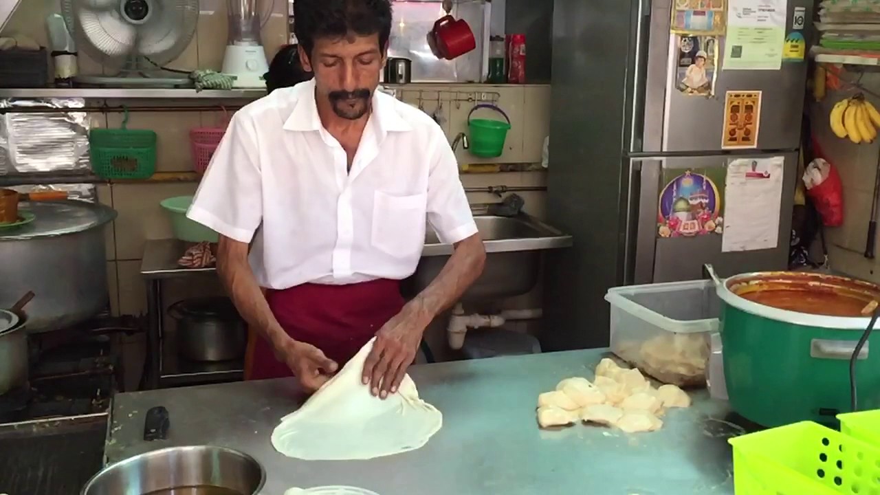 Singapore roti prata flipping master, slo-mo