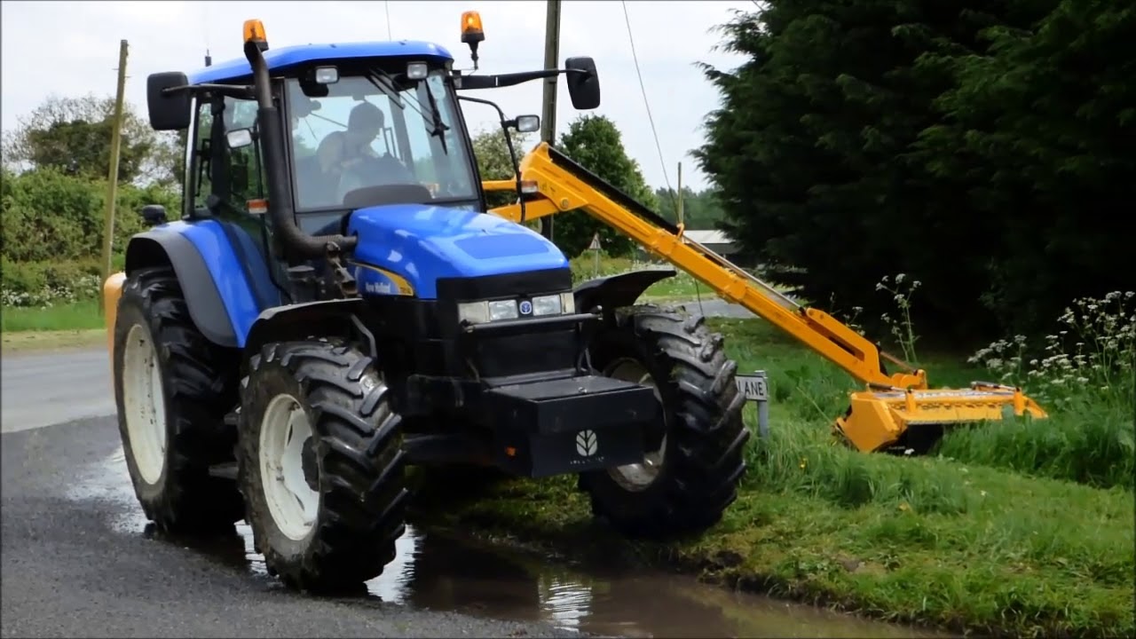 New Holland TM140 Tractor With Shelbourne Hedge Trimming