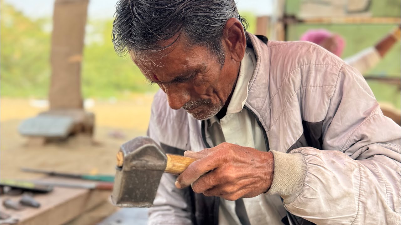 The poor man sitting on the street created an amazing item.