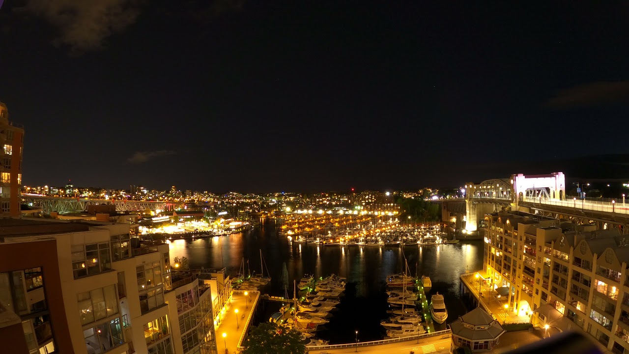 Vancouver BC Canada Downtown Granville Island and Burrard Street Bridge Timelapse at Nighttime.