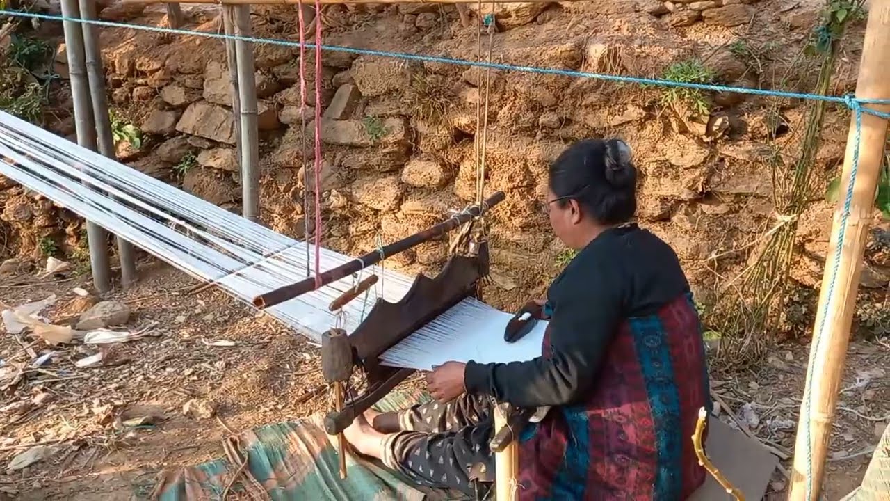 Nepali traditional cloth khadi cloth Nepali weaving mother beautiful and pappy village  life style l