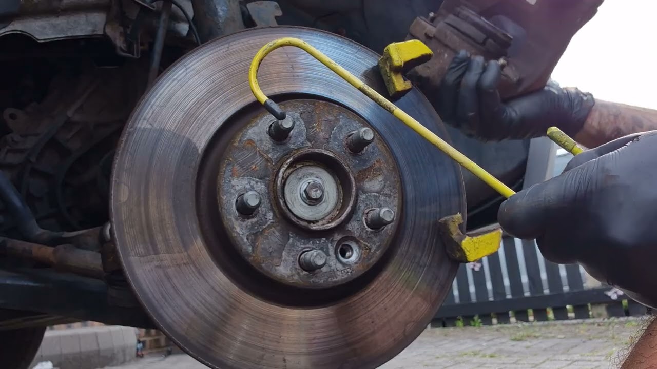 How to replace front brake discs and pads on a car