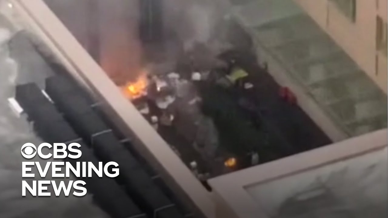 Documents burn after U.S. orders China to close consulate