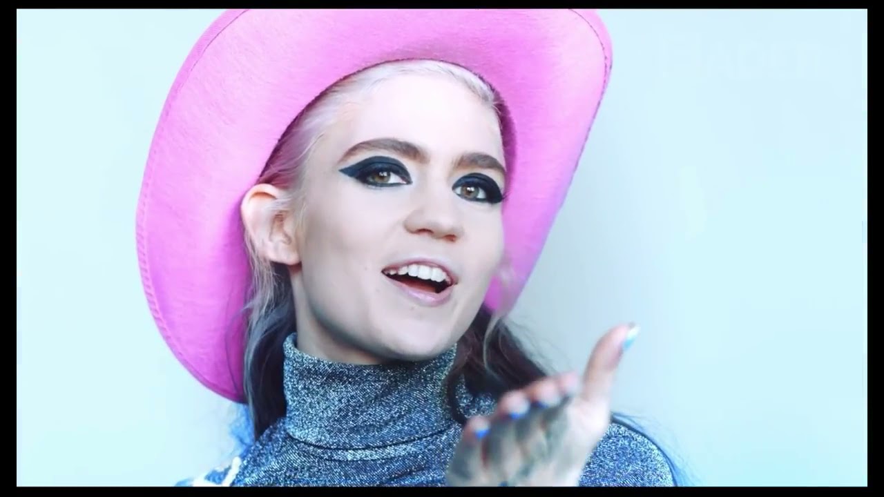 Grimes   Delicate Weapon Music Video