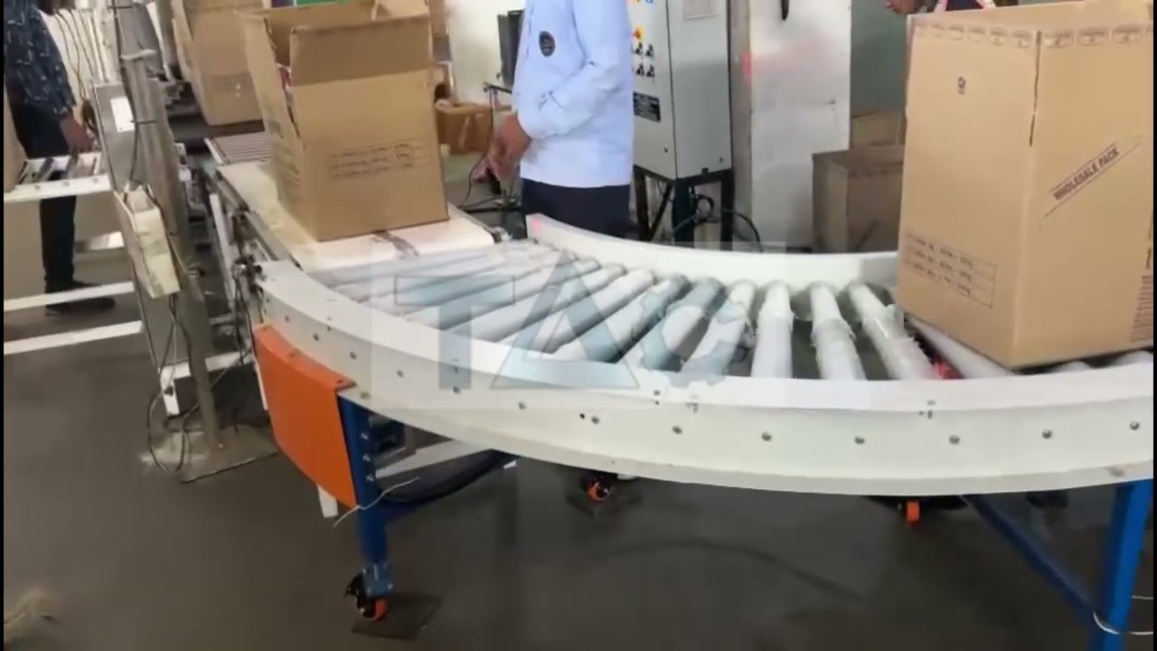 DOUBLE DECKER CARTON BOX PACKING CONVEYOR SYSTEM.