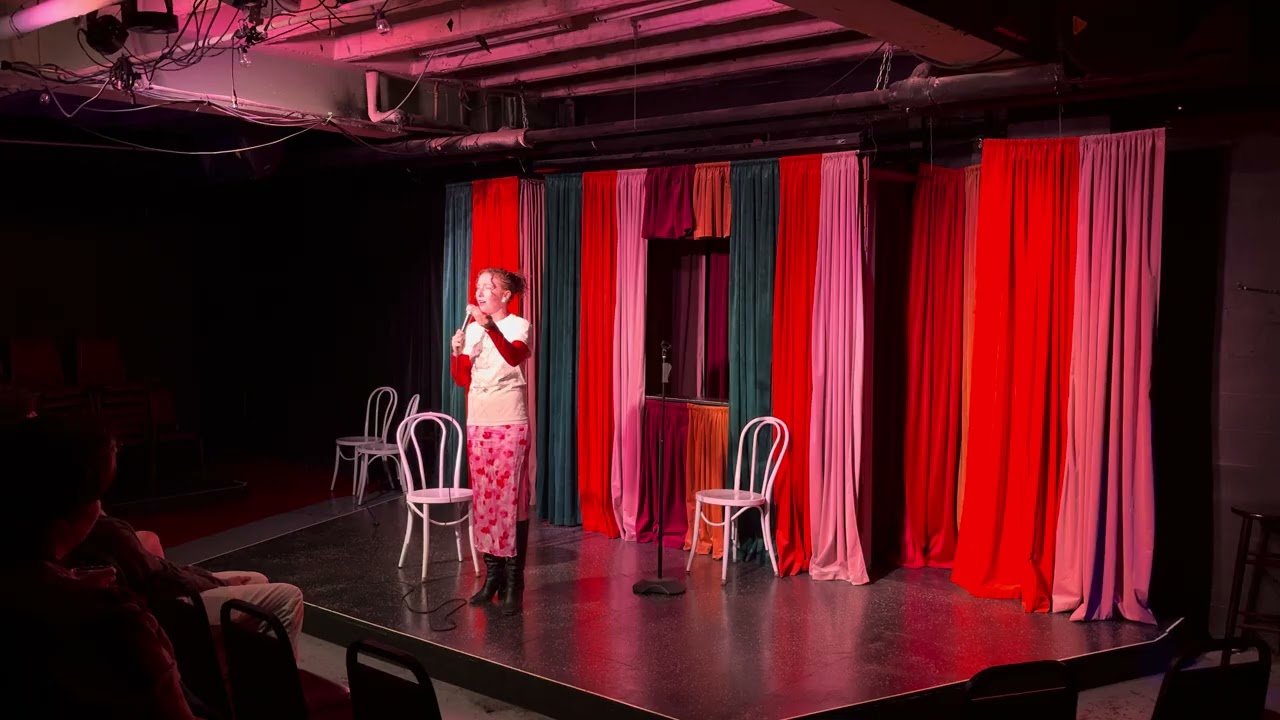 Angelina Martin doing stand-up comedy