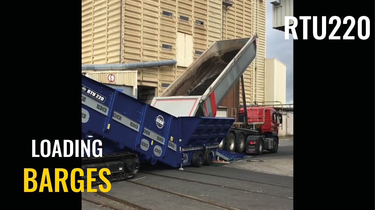 RTU220 Radial Truck Unloader loading Barges