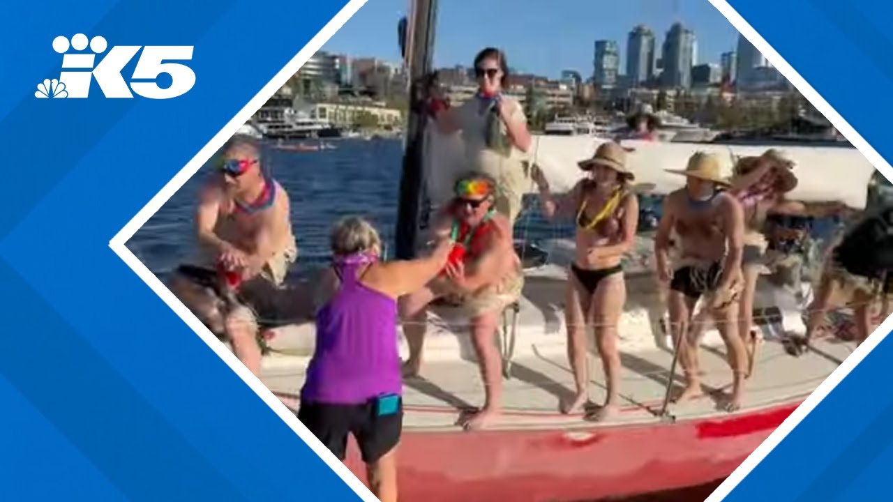 As 'Duck Dodge' sailing race turns 50, hundreds turn out for tropical-themed event on Lake Union