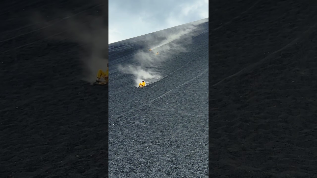 Sand boarding down an active volcano - Cerro Negro, Nicaragua